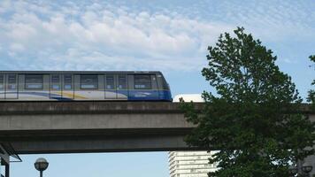 Surrey Canada Vancouver Downtown Skytrain in a big city metro above ground video