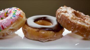 Street vendor carrying box of doughnuts, mid section, elevated view video