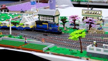 Canada Vancouver 05.17.2024 cloverdale rodeo and country fair Lego blocks houses cars streets trains trams. Real life of Lego toys close-up footage of railways in a huge city made of blocks video