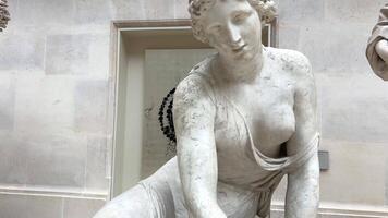 Statue of a woman with a naked breast in Louvre 26.04.22 Paris France video