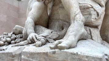 Sculpture, Louvre, France, Antoine Lyon, On the marble of the Seine is depicted, a paddle in his left hand. He is accompanied by a satyr child catching a bunch of grapes. video