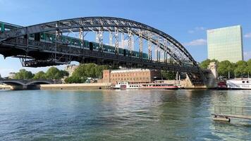 Bridge and train against the backdrop of sky and river travel and tranquility video