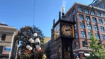 Steam rises into the sky Steam clocks in Vancouver Gastown Steam Clock is one of Vancouver's most interesting attractions. Today you will not find analogues of this kind of mechanism anywhere else. video