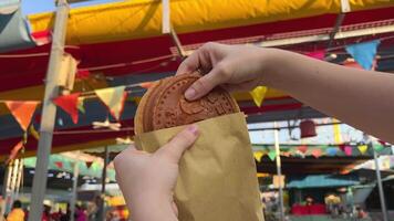 Vietnam Ho Chi Minh City Pastry pie with cheese, break off a piece, cheese stretches video