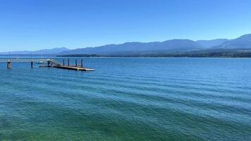 time spares nothing old abandoned ruined pier bridge of ruins left only sticks sticking out of the water beautiful sea and sky nature forever video