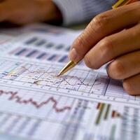 Writing a financial report, business accounting concept. photo