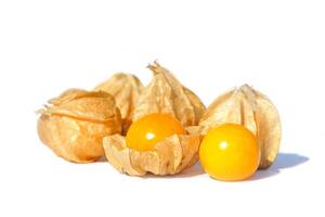 Cape gooseberry on white background. it is one of the best berries. It is a plant in the same family as eggplant. Rich in nutrients and high in vitamins. Soft and selective focus. photo