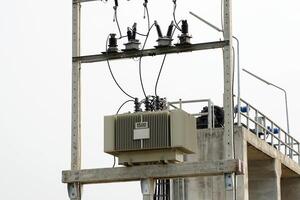 transformer is a type of electromechanical that can change the voltage level from a higher voltage to a lower according to the needs of the application. Soft and selective focus. photo