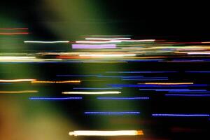 Abstract blurry background with pattern from colorful traces photo