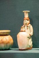 Antique ceramic decorative amphora on a white background photo