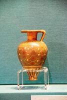 Antique ceramic decorative amphora on a white background photo