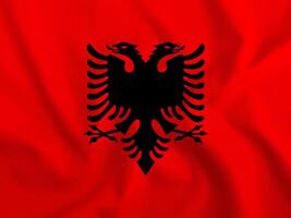 Background with 3d waving flag of Albania photo