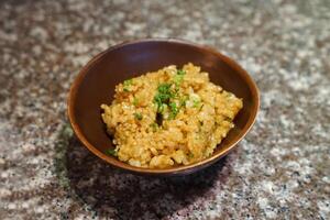 Close up stir fry Japanese rice with egg and garlic photo