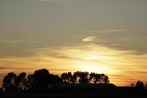 sunset in the netherlands, clouds, colors photo