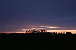 sunset in the netherlands, clouds, colors photo