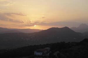 sunset behind the mountains, Spain photo