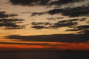 amanecer desde el mar foto