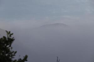 fog in the mountains, spain photo