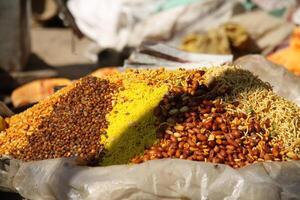 indian snack with several things like peanuts photo