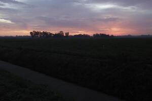 cloudy sunrise in the netherlands photo