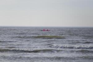 kite surfing , beach in the winter, netherlands photo