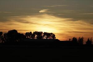 sunset in the netherlands, clouds, colors photo