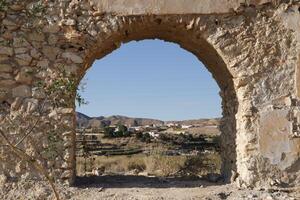 roman aqueduct in antas, spain photo