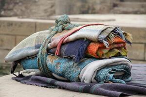 towels to dry yourself after a dip in the ganga river, varanasi, india photo