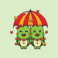 Cute couple turtle with umbrella at autumn season vector