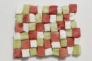 mosaic of a salad of watermelon, cucumber, feta cheese photo