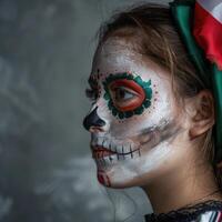 Portrait of a young woman with makeup of day of the dead and mexican flag photo