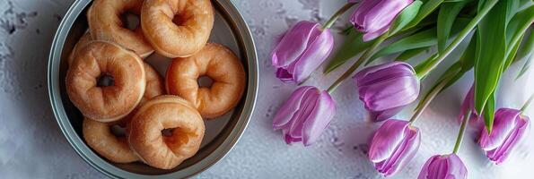 Doughnuts and Purple Tulips, Sweet Treats and Floral Delights photo