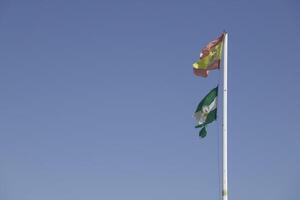 flags of andalucia and spain photo