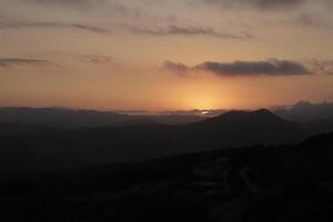 sunrise in the mountains of periana, spain photo