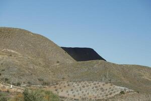 mountains and one in the shadow photo