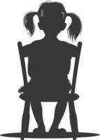 Silhouette little girl sitting in the chair black color only vector