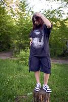 a teenage girl in black clothes in grunge style photo