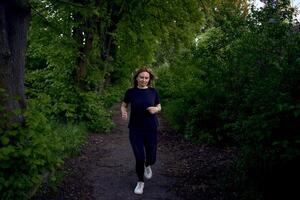 woman runs in the park photo