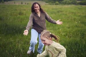 mother plays catch up with her daughters photo