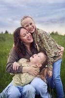 mother plays catch up with her daughters photo