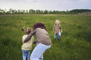 mother plays catch up with her daughters photo