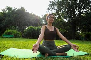 Cute Young Model Doing Deep Breathing Exercise In Open Fresh Air photo