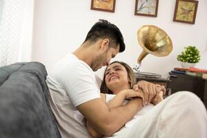 Portrait Of A Young Couple Spending A Romantic Evening At Home photo