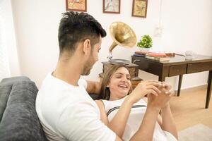 Image Of Happy Couple Holding Hands Of Each Other photo