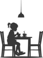 Silhouette little girl sitting at a table in the cafe black color only vector