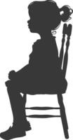 Silhouette little girl sitting in the chair black color only vector