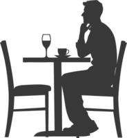 silueta hombre sentado a un mesa en el café negro color solamente vector