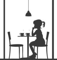 Silhouette little girl sitting at a table in the cafe black color only vector