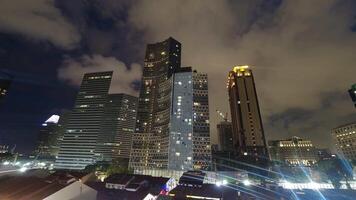 Singapore city, Singapore , 2024 - residential house rooftops and modern skyscrapers background SIngapore city with blue sky video