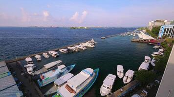 Male, Maldives - 15th april, 2024 - yachts and boats in harbor motion timelapse in Maldives coastline video